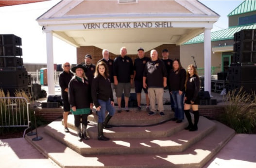 Group posing at the Vern Cermak Band Shell